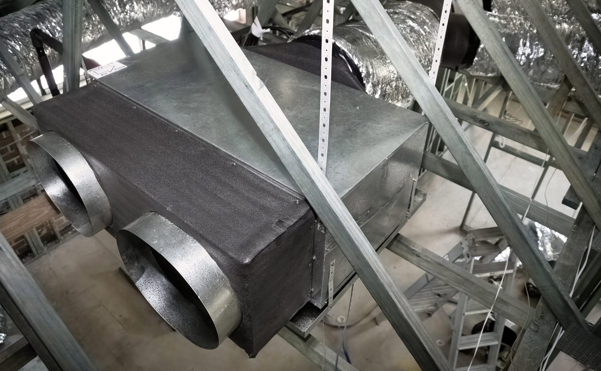 Rinnai slimline ducted fan coil unit installed in a Melbourne roof cavity