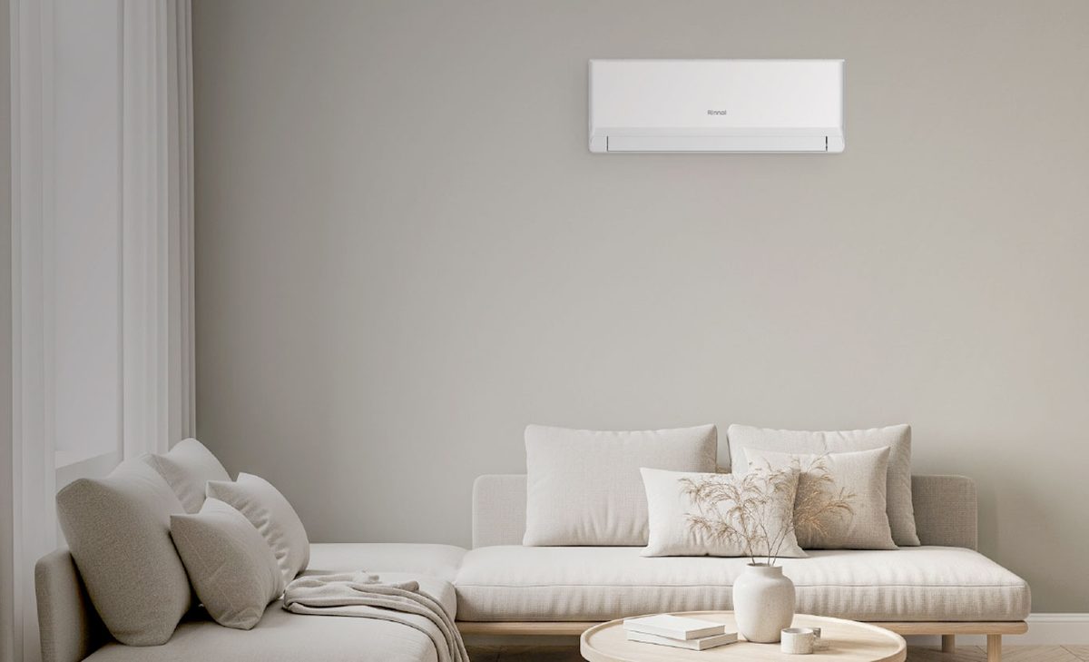 Rinnai JX Series wall-mounted split system indoor unit in a modern Melbourne living room